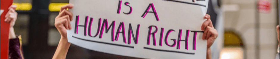 sign saying health care is a human right