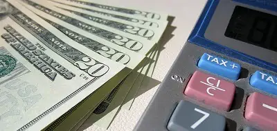 money next to a calculator
