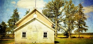 Rustic school building in a field