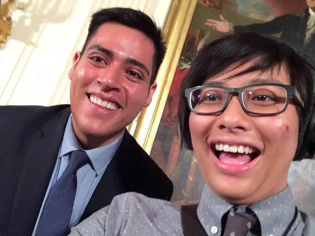 [Elly smiles alongside Manuel Contreras from 1vyG, the inter-Ivy, first-generation college student network.]