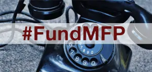 A rotary phone with the text "#FundMFP" over it