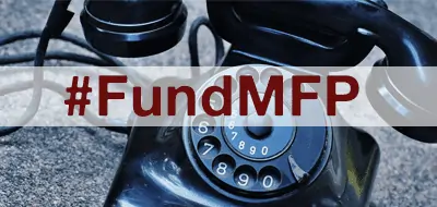 A rotary phone with the text "#FundMFP" over it