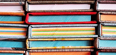 a stack of colorful books